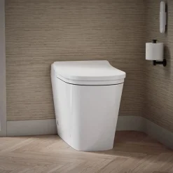 One-piece elongated smart toilet with front bidet wand technology, dual-flush