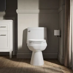 One-piece elongated toilet with concealed trapway, 1.28 gpf