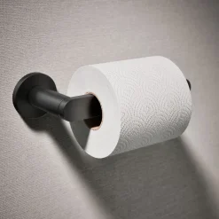 Pivoting toilet paper holder