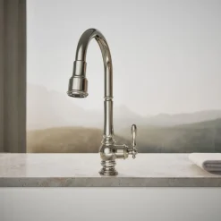 Pull-down kitchen sink faucet with three-function sprayhead