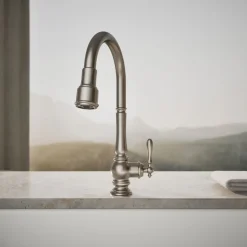 Pull-down kitchen sink faucet with three-function sprayhead