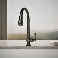 Pull-down kitchen sink faucet with three-function sprayhead