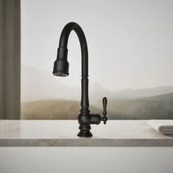 Pull-down kitchen sink faucet with three-function sprayhead