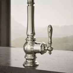 Pull-down kitchen sink faucet with three-function sprayhead