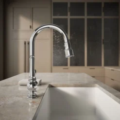 Pull-down kitchen sink faucet with three-function sprayhead