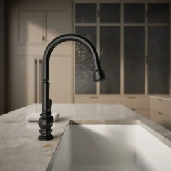 Pull-down kitchen sink faucet with three-function sprayhead