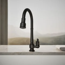 Pull-down kitchen sink faucet with three-function sprayhead