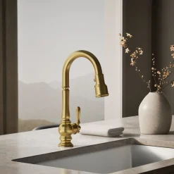 Pull-down kitchen sink faucet with three-function sprayhead