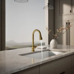 Pull-down kitchen sink faucet with three-function sprayhead