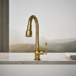Pull-down kitchen sink faucet with three-function sprayhead