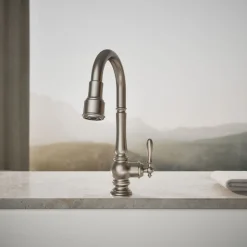 Pull-down kitchen sink faucet with three-function sprayhead