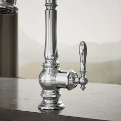 Pull-down kitchen sink faucet with three-function sprayhead