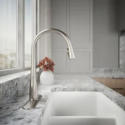 Pull-down kitchen sink faucet with three-function sprayhead