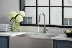 Pull-down kitchen sink faucet with three-function sprayhead