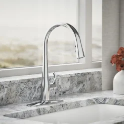 Pull-down kitchen sink faucet with three-function sprayhead