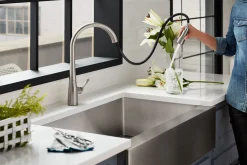 Pull-down kitchen sink faucet with three-function sprayhead