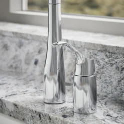 Pull-down kitchen sink faucet with three-function sprayhead