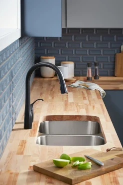 Pull-down kitchen sink faucet with three-function sprayhead