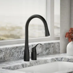 Pull-down kitchen sink faucet with three-function sprayhead
