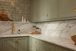 Pull-down kitchen sink faucet with three-function sprayhead