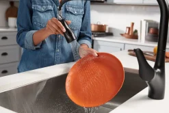 Pull-down kitchen sink faucet with two-function sprayhead