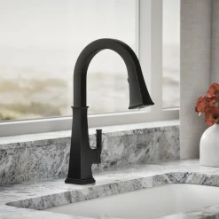 Pull-down kitchen sink faucet with three-function sprayhead