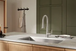 Pull-down kitchen sink faucet with three-function sprayhead