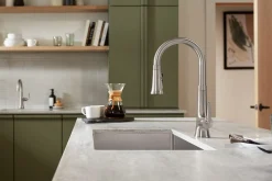 Pull-down kitchen sink faucet with three-function sprayhead