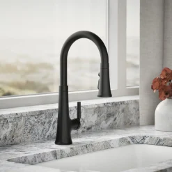 Pull-down kitchen sink faucet with three-function sprayhead
