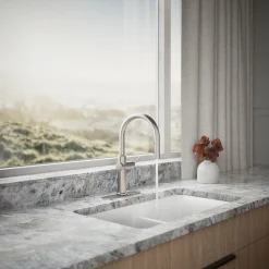 Pull-down kitchen sink faucet with three-function sprayhead