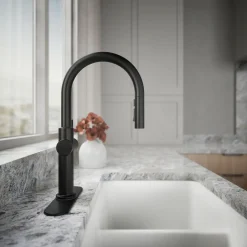 Pull-down kitchen sink faucet with three-function sprayhead
