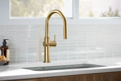 Pull-down kitchen sink faucet with three-function sprayhead