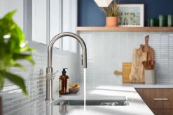 Pull-down kitchen sink faucet with three-function sprayhead