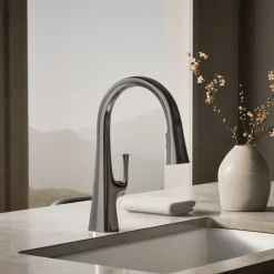 Pull-down kitchen sink faucet with three-function sprayhead
