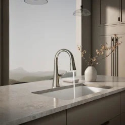 Pull-down kitchen sink faucet with three-function sprayhead
