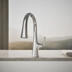 Pull-down kitchen sink faucet with three-function sprayhead