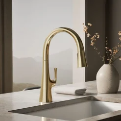 Pull-down kitchen sink faucet with three-function sprayhead