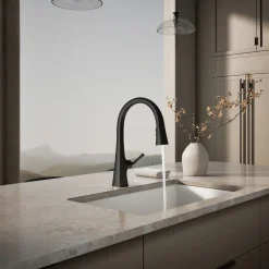 Pull-down kitchen sink faucet with three-function sprayhead