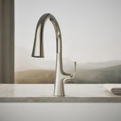 Pull-down kitchen sink faucet with three-function sprayhead