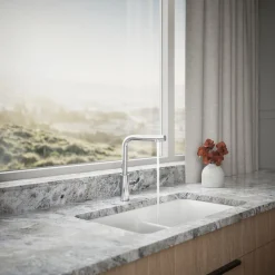 Pull-out kitchen sink faucet with two-function sprayhead