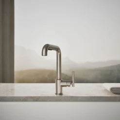 Pull-out kitchen sink faucet with three-function sprayhead