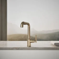 Pull-out kitchen sink faucet with three-function sprayhead