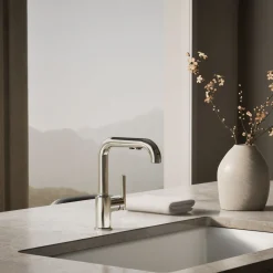 Pull-out kitchen sink faucet with three-function sprayhead