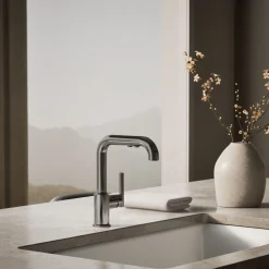 Pull-out kitchen sink faucet with three-function sprayhead