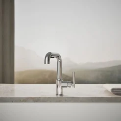 Pull-out kitchen sink faucet with three-function sprayhead
