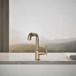 Pull-out kitchen sink faucet with three-function sprayhead