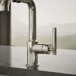 Pull-out kitchen sink faucet with three-function sprayhead