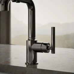 Pull-out kitchen sink faucet with three-function sprayhead