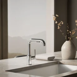 Pull-out kitchen sink faucet with three-function sprayhead