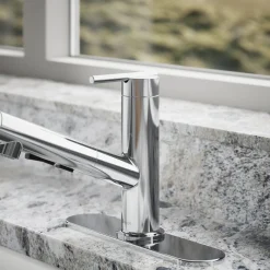 Pull-out kitchen sink faucet with three-function sprayhead